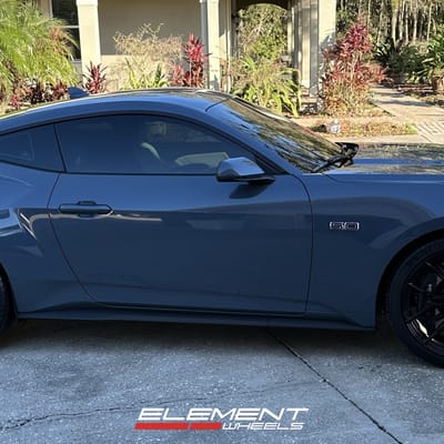 Staggered 20 inch Variant Nysa in Gloss Black on a 2024 Ford Mustang GT