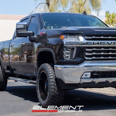 22 inch Moto Metal MO970 Gloss Black Milled Lip on a 2020 Chevrolet Silverado LTZ 3500