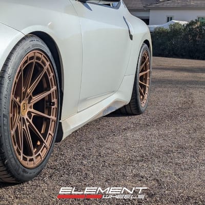19 inch Staggered Variant Aure in Gloss Bronze on a 2024 Nissan Z