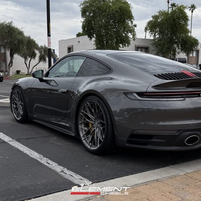 Staggered Set 20/21 inch Variant Maxim in Raw Titanium on a 2020 Porsche 911 Carrera 992