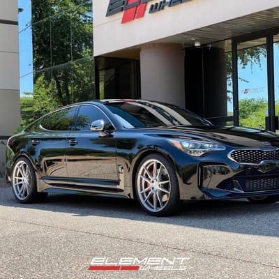 Staggered 20 Inch Rohana RFX2 in Brushed Titanium on a 2018 Kia Stinger GT