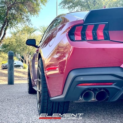 Staggered 20 inch Variant Nysa in Gloss Bronze on a 2024 Ford Mustang GT