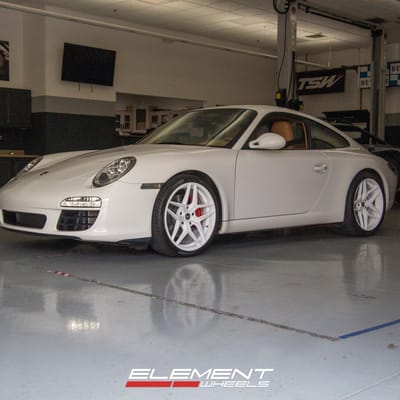 Staggered 19 Inch Variant Xenon in Gloss White on a 2011 Porsche 911 S 997 Narrowbody