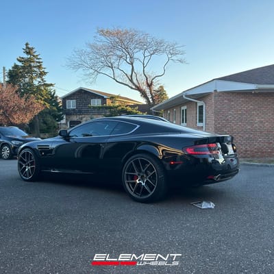 Staggered 20 inch Ace Alloy AFF02 in Gloss Mica Grey Machined on a 2005 Aston Martin DB9
