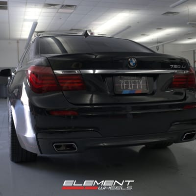 Staggered 20 Inch Variant Argon in Gloss Black on a 2014 BMW 750Li