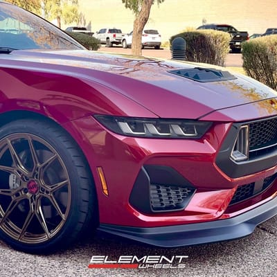 Staggered 20 inch Variant Nysa in Gloss Bronze on a 2024 Ford Mustang GT