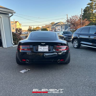 Staggered 20 inch Ace Alloy AFF02 in Gloss Mica Grey Machined on a 2005 Aston Martin DB9