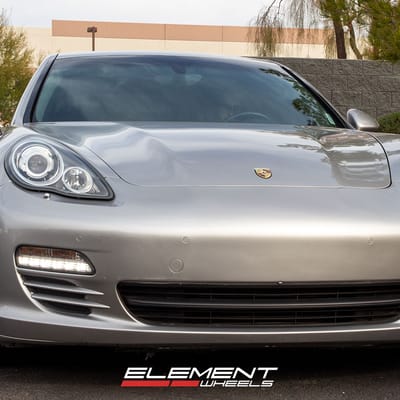 22 inch Staggered Lexani Spike Gloss Black on a 2012 Porsche Panamera 4