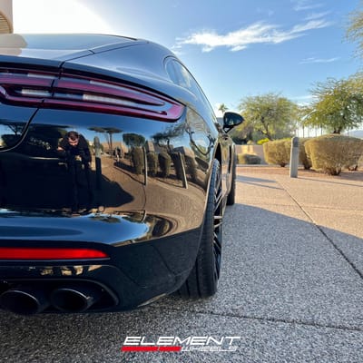 22 inch Staggered Curva Concepts C48 Gloss Black on a 2018 Porsche Panamera Turbo
