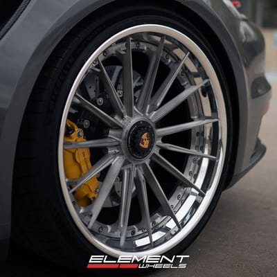 21/22 Double Staggered Variant NTZ-3P Brushed Titanium w/ Polished Lip on a 2024 911 Porsche Turbo S w/ Carbon Ceramic Brakes (Centerlock)