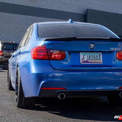 19 inch Staggered Varro VD36X Gloss Black on a 2014 BMW 335i RWD w/ 4 Piston Grey Brakes