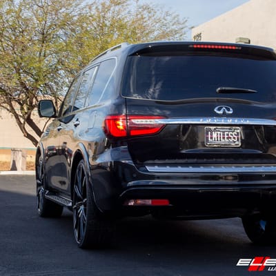 26 inch Lexani CSS-15 Gloss Black Machined Tips w/ Covered Cap on a 2019 Infiniti QX80