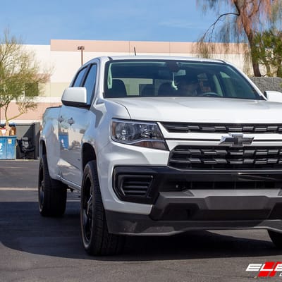 20 inch Moto Metal MO970 Gloss Black Milled Spoke on a 2020 Chevrolet Colorado