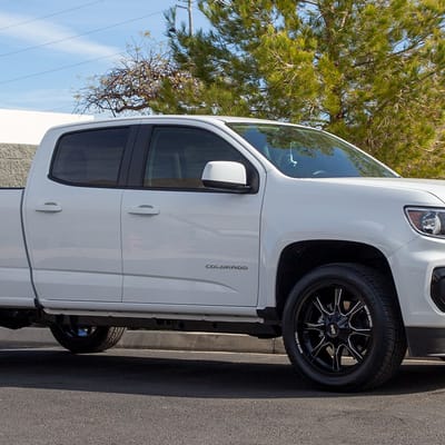 20 inch Moto Metal MO970 Gloss Black Milled Spoke on a 2020 Chevrolet Colorado