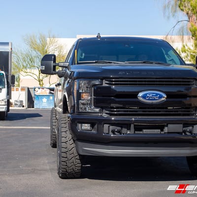 20 inch Cali Off-Road Summit 9110 Gloss Black w/ Red Milled Spokes on a 2019 Ford F-250
