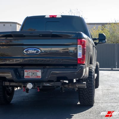 20 inch Cali Off-Road Summit 9110 Gloss Black w/ Red Milled Spokes on a 2019 Ford F-250