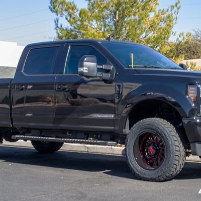 20 inch Cali Off-Road Summit 9110 Gloss Black w/ Red Milled Spokes on a 2019 Ford F-250