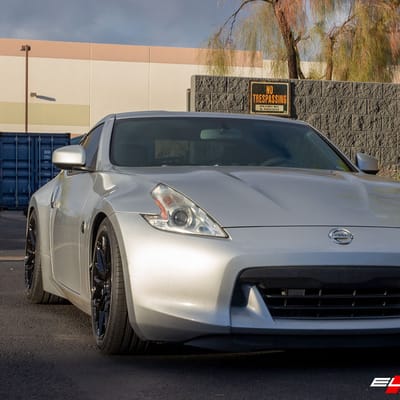19 inch Staggered Variant Radon Gloss Piano Black on a 2012 Nissan 370z Touring