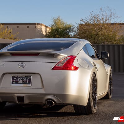 19 inch Staggered Variant Radon Gloss Piano Black on a 2012 Nissan 370z Touring