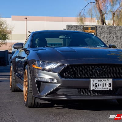 20 inch Staggered Variant Xenon Brushed Bronze w/ Blood Red Center Cap on a 2019 Ford Mustang GT