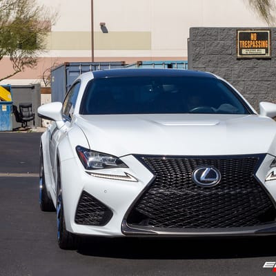 20 inch Staggered Lexani R-Twelve Gloss Black Machined w/ Chrome Stainless Lip on a 2015 Lexus RC-F