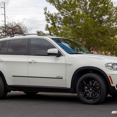 20 inch Staggered Variant Radon Gloss Piano Black on a 2013 BMW X5