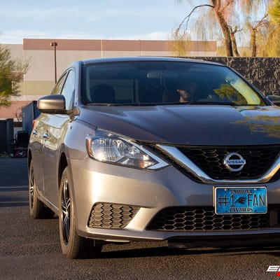 16 inch Touren TR62 Gloss Black Machined Face & Machined Lip on a 2019 Nissan Sentra