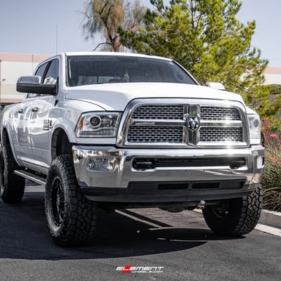 18 inch Moto Metal MO962 Gloss Black Milled on a Lifted 2014 Dodge Ram 2500