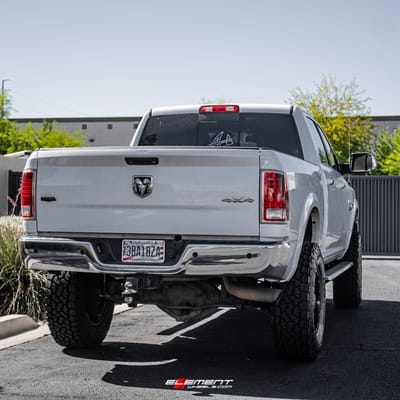 18 inch Moto Metal MO962 Gloss Black Milled on a Lifted 2014 Dodge Ram 2500