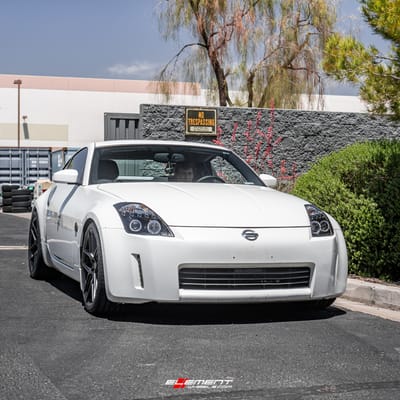 19 inch Staggered TSW Tabac Semi Gloss Black on a 2004 Nissan 350Z