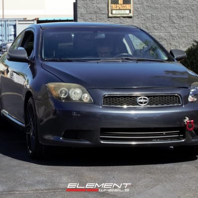 18 Inch Helo He912 Gloss Black on a 2008 Scion TC