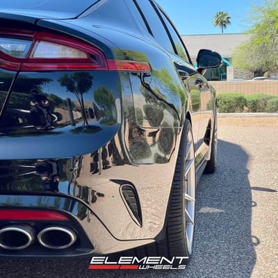 Staggered 20 Inch Rohana RFX2 in Brushed Titanium on a 2018 Kia Stinger GT