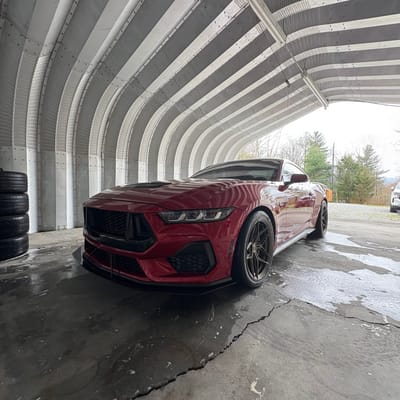 Staggered 19 inch Variant Zeno in Gloss Bronze on a 2024 Ford Mustang 5.0 S650