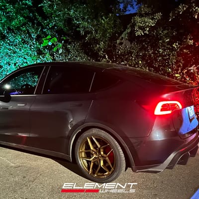 20 inch Rohana RFX11 in Brushed Bronze on a 2024 Tesla Model Y Performance