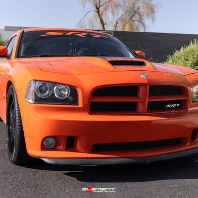 22 inch Staggered Lexani Turbine Gloss Black on a 2009 Dodge Charger SRT