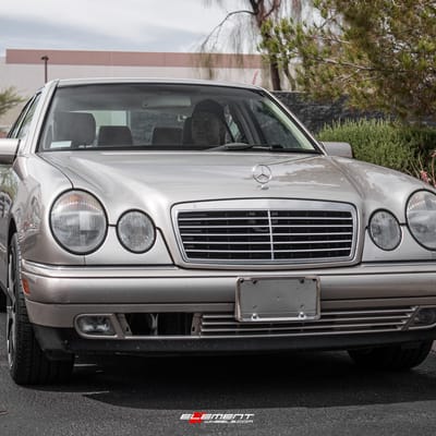 18 inch Staggered TSW Nurburgring Gunmetal w/ Mirror Face on a 1999 Mercedes Benz E Class