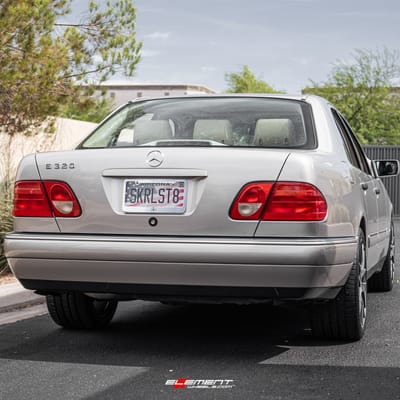 18 inch Staggered TSW Nurburgring Gunmetal w/ Mirror Face on a 1999 Mercedes Benz E Class