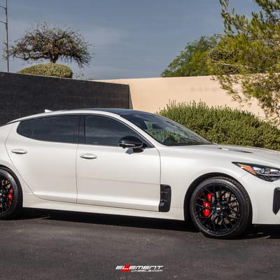 19 inch Staggered Variant Radon Gloss Piano Black on a 2022 Kia Stinger GT