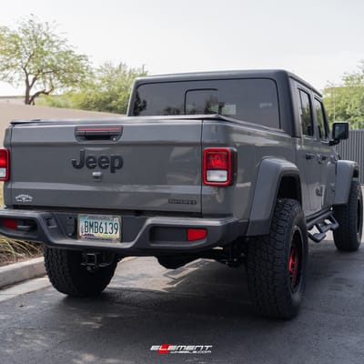18 inch KMC KM540 Recon Gloss Black Machined w/ Red Tint on a Lifted 2021 Jeep Gladiator