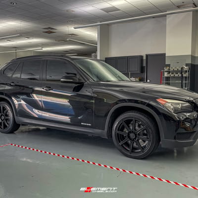 18 inch Motegi MR142 Satin Black on a 2014 BMW X1