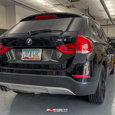 18 inch Motegi MR142 Satin Black on a 2014 BMW X1