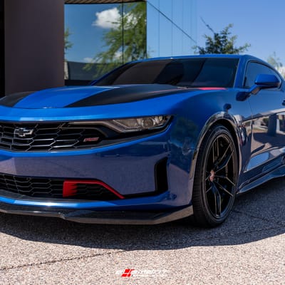 20 inch Staggered Variant Krypton Gloss Piano Black w/ Red Cap on a 2019 Chevrolet Camaro RS