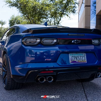 20 inch Staggered Variant Krypton Gloss Piano Black w/ Red Cap on a 2019 Chevrolet Camaro RS
