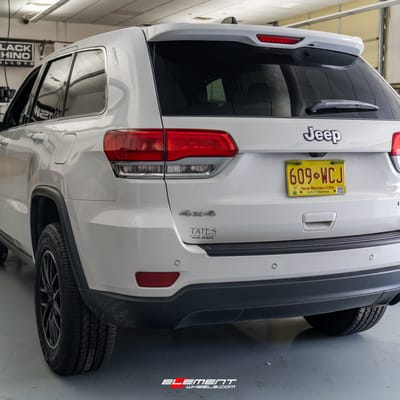 18 inch Touren TR60 Matte Black w/  Machine Ring on a 2017 Jeep Grand Cherokee