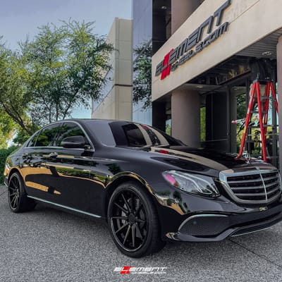 20 inch Staggered Ferrada FR4 Matte Black w/ Gloss Black Lip on a 2017 Mercedes Benz E300 Sedan