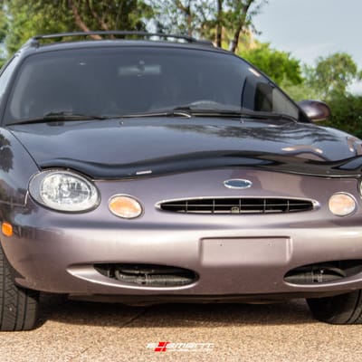 18 inch Ruff Speedster Hyper Silver on a 1996 Ford Taurus
