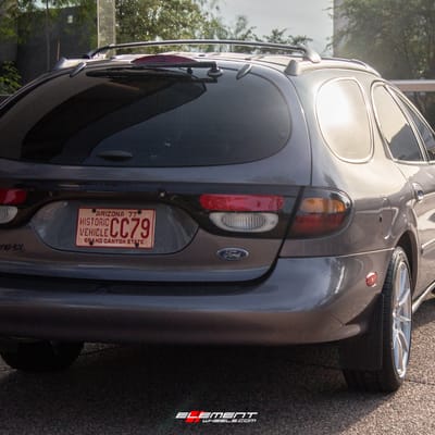 18 inch Ruff Speedster Hyper Silver on a 1996 Ford Taurus