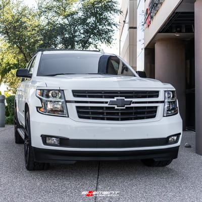 24 inch Lexani CSS-15 Full Gloss Black w/ Covered Cap on a 2019 Chevrolet Tahoe