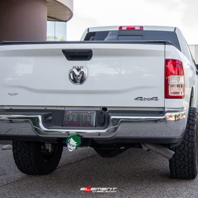 20 inch Cali Off-Road Summit 9110 Gloss Black w/ Blue Milled Spokes on a Leveled 2021 Dodge Ram 2500 HD