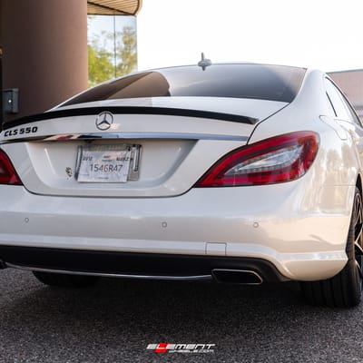 20 inch Staggered Niche Misano Satin Black M117 on a 2012 Mercedes Benz CLS550